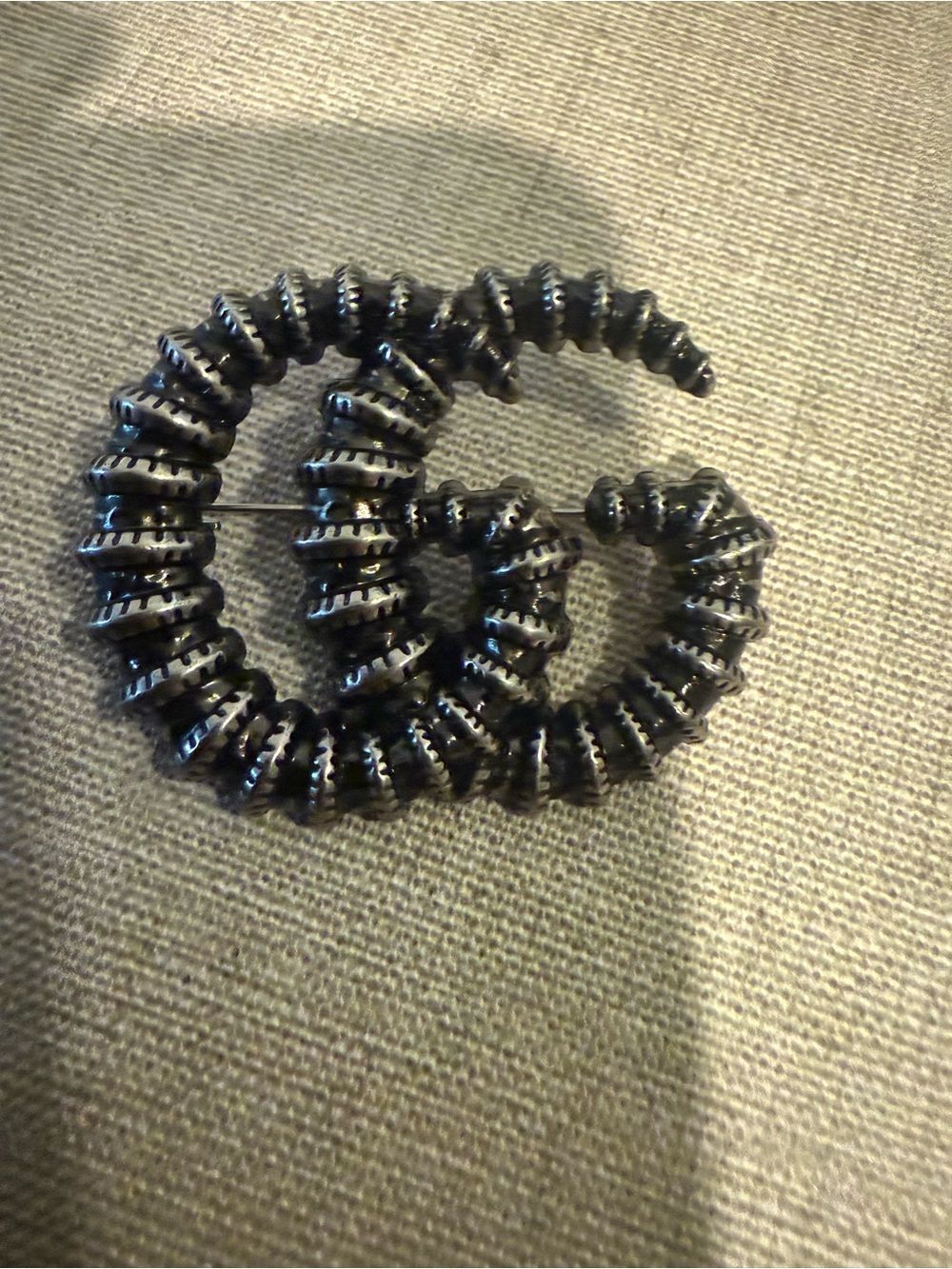 New with box Gucci gun metal color gg brooch